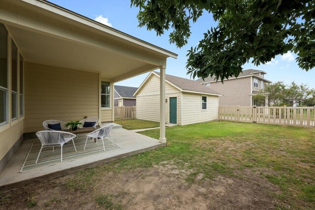 1267 Sanders, Kyle, TX 78640 - fenced backyard with a patio area
