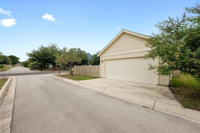 1267 Sanders, Kyle, TX 78640 - garage featuring concrete driveway