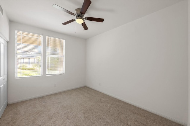 1267 Sanders, Kyle, TX 78640 - unfurnished room featuring light colored carpet and ceiling fan