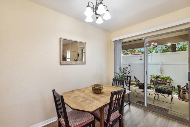 401 Buttercup Creek Blvd Unit 1904, Cedar Park, TX 78613 - dining area featuring a chandelier and dark wood-style flooring