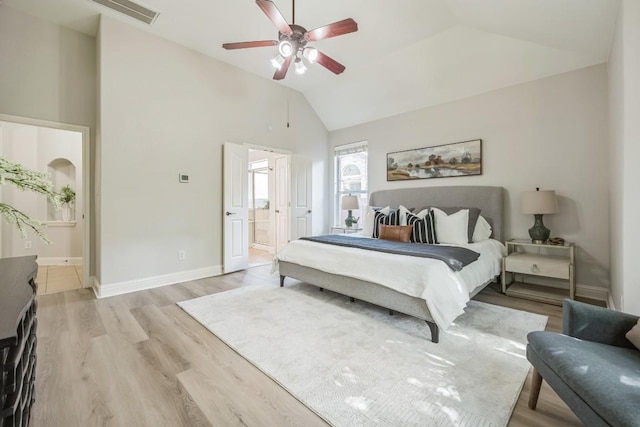 112 Mcbride Ln, Cedar Park, TX 78613 - bedroom featuring ensuite bath, light wood-style flooring, a ceiling fan, and high vaulted ceiling