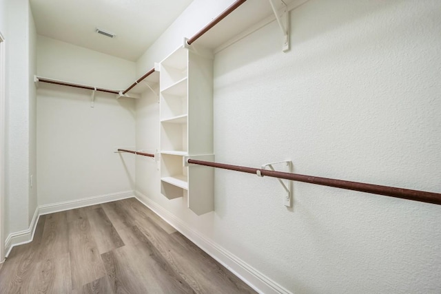 112 Mcbride Ln, Cedar Park, TX 78613 - walk in closet with wood finished floors