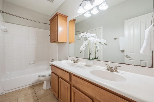 112 Mcbride Ln, Cedar Park, TX 78613 - full bathroom featuring double vanity, tile patterned flooring, and washtub / shower combination
