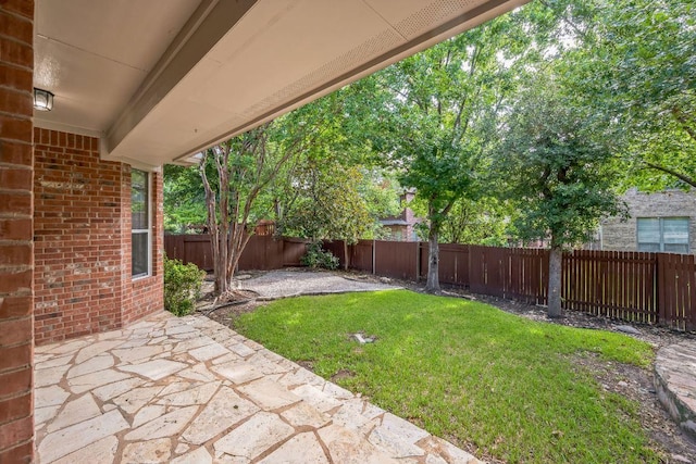 112 Mcbride Ln, Cedar Park, TX 78613 - fenced backyard with a patio area