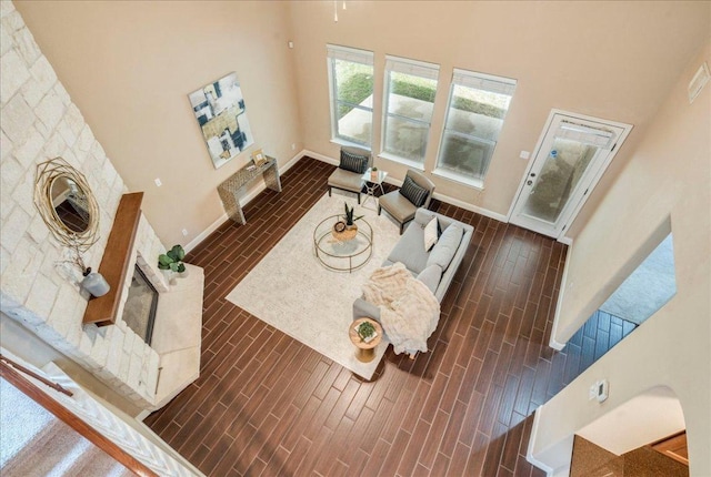 8024 Levata Dr, Austin, TX 78739 - living room featuring a high ceiling and dark wood-style flooring