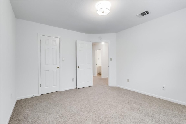 12608 Chittim Cir, Austin, TX 78732 - unfurnished bedroom with light colored carpet and baseboards