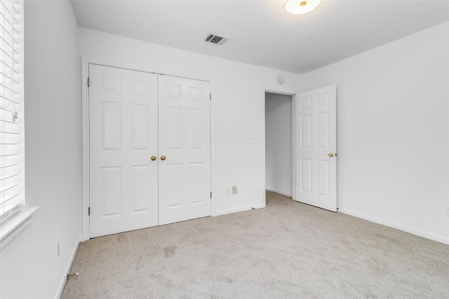 12608 Chittim Cir, Austin, TX 78732 - unfurnished bedroom featuring carpet floors and a closet