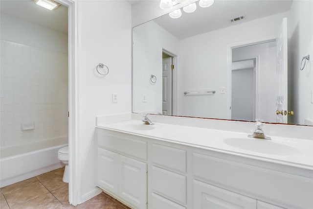 12608 Chittim Cir, Austin, TX 78732 - full bathroom with double vanity, tile patterned flooring, and washtub / shower combination