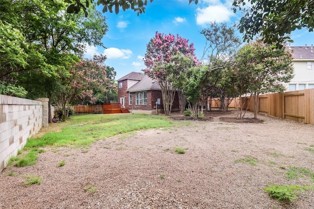 12608 Chittim Cir, Austin, TX 78732 - fenced backyard featuring a wooden deck