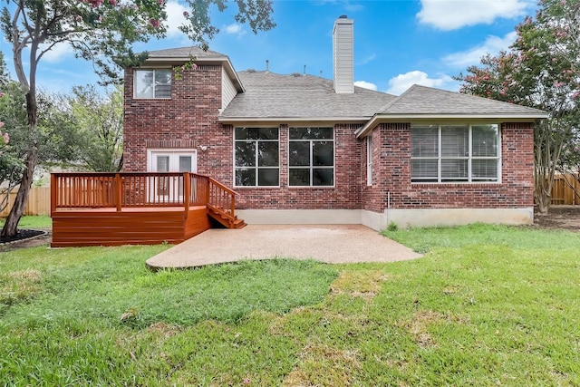 12608 Chittim Cir, Austin, TX 78732 - back of property with brick siding, a deck, a chimney, a patio area, and a shingled roof