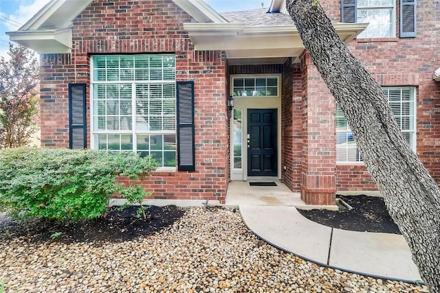 12608 Chittim Cir, Austin, TX 78732 - doorway to property with brick siding