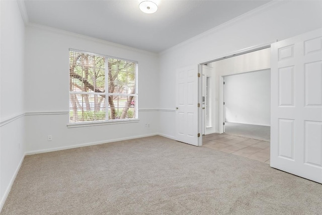 12608 Chittim Cir, Austin, TX 78732 - unfurnished bedroom with carpet floors, ornamental molding, and tile patterned floors