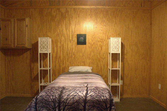 600 Jim Bowie Dr, Spicewood, TX 78669 - bedroom with wood walls and carpet floors