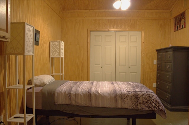 600 Jim Bowie Dr, Spicewood, TX 78669 - bedroom with wooden walls, a closet, and wooden ceiling