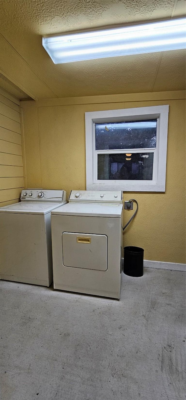 600 Jim Bowie Dr, Spicewood, TX 78669 - washroom with washer and dryer and carpet