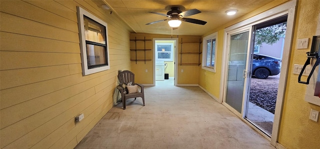 600 Jim Bowie Dr, Spicewood, TX 78669 - corridor with wooden walls
