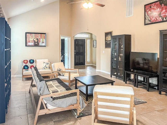 632 Schefer St, Leander, TX 78641 - living area featuring arched walkways, a ceiling fan, and high vaulted ceiling