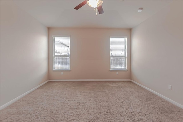 632 Schefer St, Leander, TX 78641 - empty room with carpet floors, a ceiling fan, and healthy amount of natural light