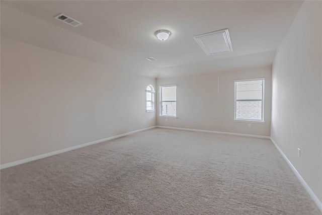 632 Schefer St, Leander, TX 78641 - empty room with attic access and carpet floors