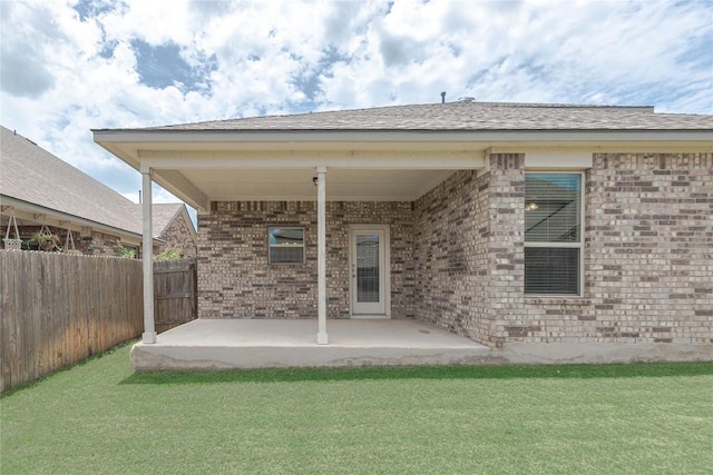 632 Schefer St, Leander, TX 78641 - back of house with a patio and brick siding