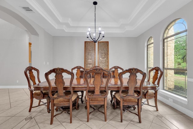 1130 Whispering Water, Spring Branch, TX 78070 - dining room featuring a chandelier, a tray ceiling, arched walkways, light tile patterned flooring, and ornamental molding