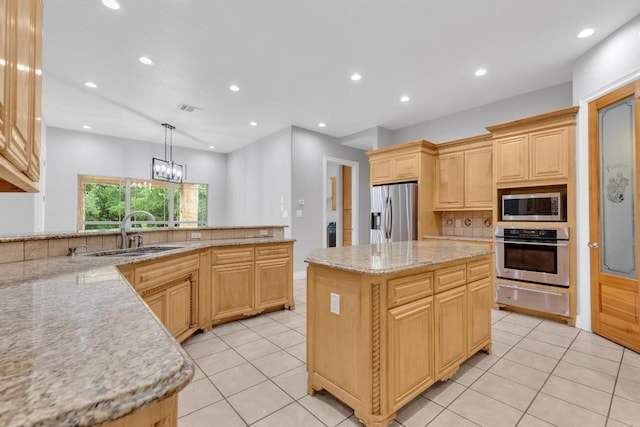 1130 Whispering Water, Spring Branch, TX 78070 - kitchen with stainless steel appliances, a warming drawer, light tile patterned floors, recessed lighting, and a center island