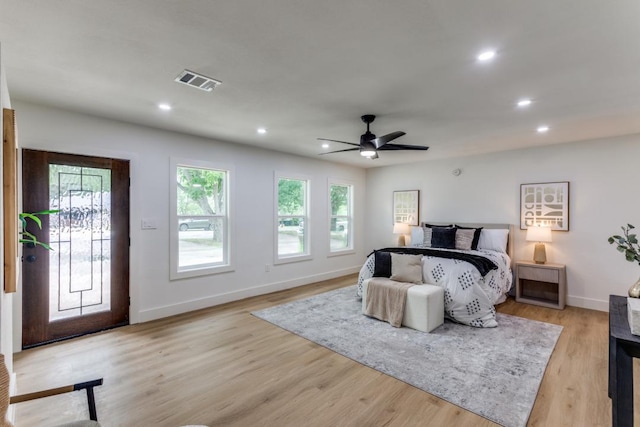 606 Lilac Dr, Round Rock, TX 78664 - bedroom featuring access to exterior, multiple windows, recessed lighting, light wood-type flooring, and ceiling fan