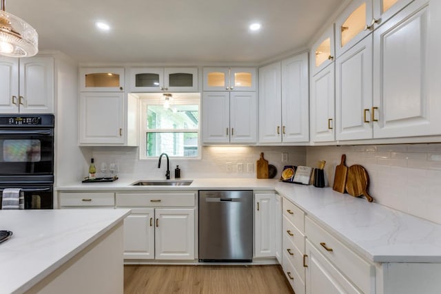 606 Lilac Dr, Round Rock, TX 78664 - kitchen featuring dishwasher, white cabinetry, backsplash, and recessed lighting