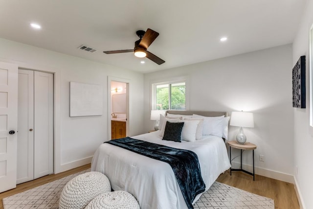 606 Lilac Dr, Round Rock, TX 78664 - bedroom featuring light wood finished floors, recessed lighting, connected bathroom, a closet, and ceiling fan