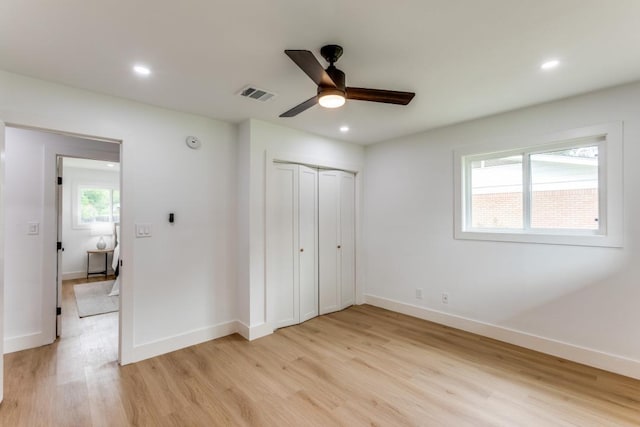 606 Lilac Dr, Round Rock, TX 78664 - unfurnished bedroom featuring light wood finished floors, recessed lighting, a closet, and ceiling fan