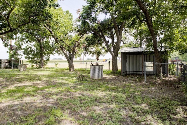 400 N Brazos St, Granger, TX 76530 - view of yard featuring an outbuilding