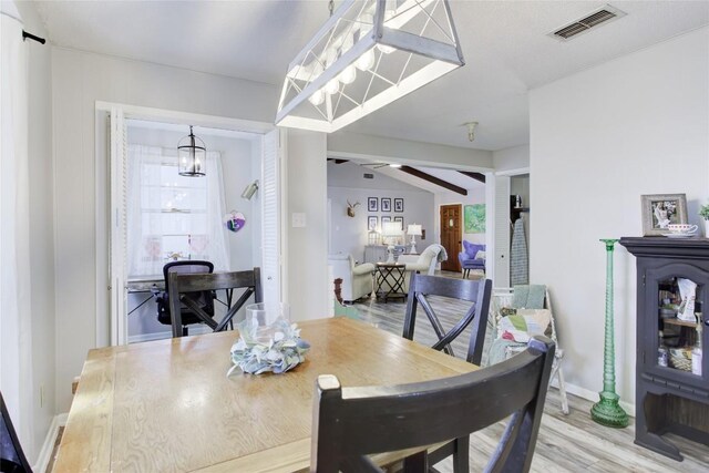 400 N Brazos St, Granger, TX 76530 - dining space featuring light wood-style flooring and baseboards