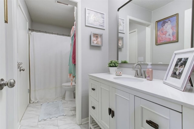 400 N Brazos St, Granger, TX 76530 - bathroom with marble finish flooring, vanity, and a shower with curtain