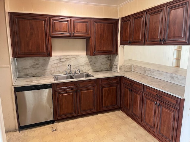 4307 Leslie Ave, Austin, TX 78721 - kitchen featuring stainless steel dishwasher, light countertops, light flooring, tasteful backsplash, and crown molding