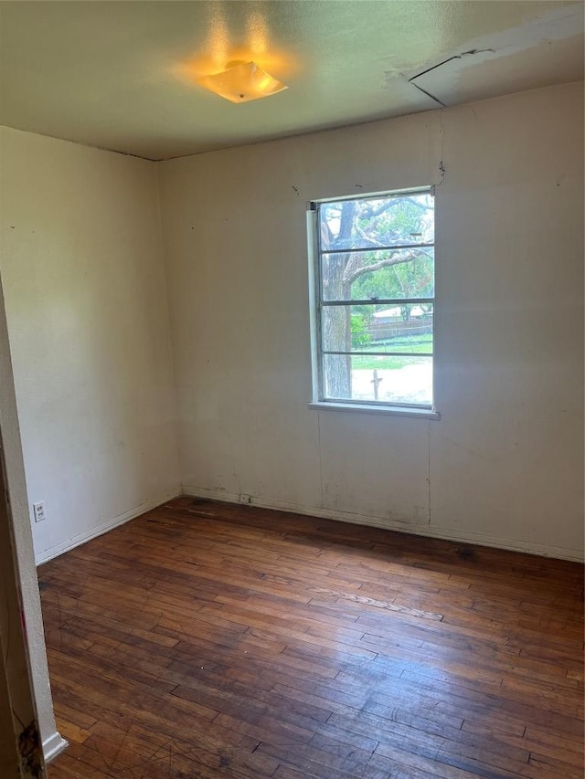 4307 Leslie Ave, Austin, TX 78721 - unfurnished room featuring hardwood / wood-style floors