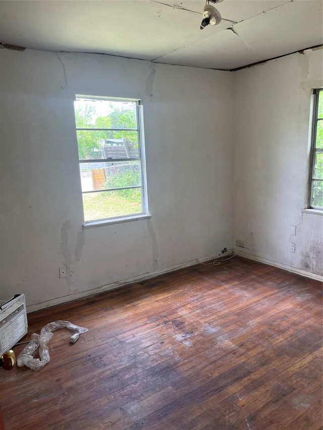 4307 Leslie Ave, Austin, TX 78721 - unfurnished room featuring hardwood / wood-style flooring