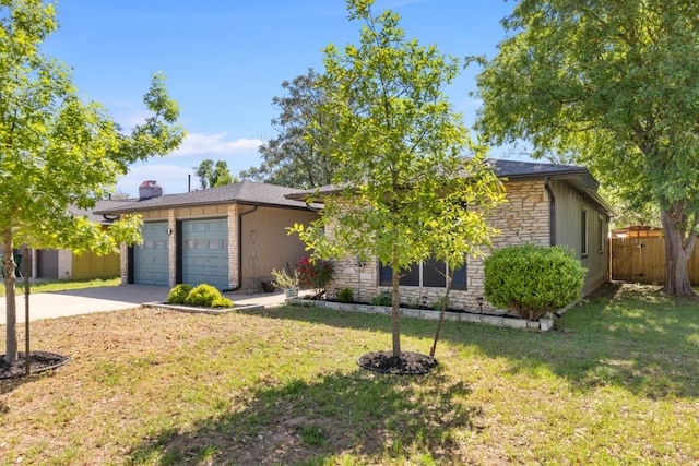 901 Pack Saddle Pass, Round Rock, TX 78681 - ranch-style house featuring stone siding, a garage, driveway, and a chimney