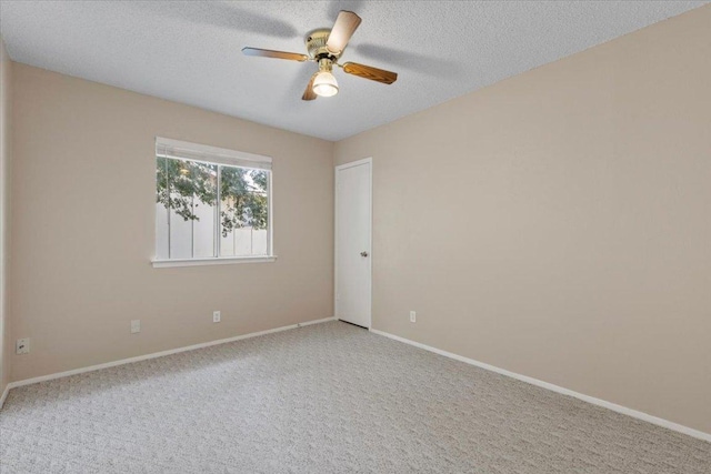 901 Pack Saddle Pass, Round Rock, TX 78681 - carpeted empty room with ceiling fan and a textured ceiling