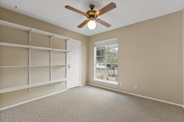 901 Pack Saddle Pass, Round Rock, TX 78681 - carpeted empty room featuring ceiling fan and a textured ceiling