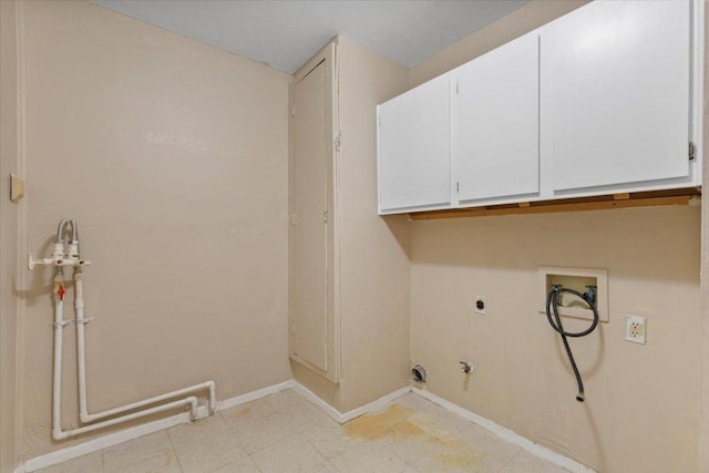 901 Pack Saddle Pass, Round Rock, TX 78681 - laundry room with hookup for a gas dryer, hookup for a washing machine, electric dryer hookup, cabinet space, and light floors