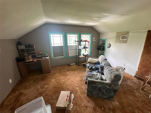 321 Douglas St, Lexington, TX 78947 - living area featuring vaulted ceiling, a wall mounted AC, and carpet