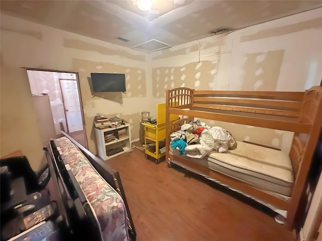 321 Douglas St, Lexington, TX 78947 - bedroom with wood finished floors