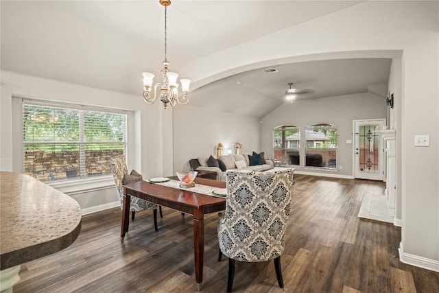 3792 Turetella Dr, Round Rock, TX 78681 - dining room with vaulted ceiling, arched walkways, a chandelier, dark wood-type flooring, and ceiling fan