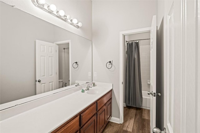 3792 Turetella Dr, Round Rock, TX 78681 - full bathroom with vanity, wood finished floors, and shower / bathtub combination with curtain