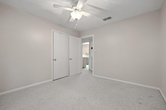 1314 Cloverleaf Dr, Austin, TX 78723 - unfurnished bedroom featuring a ceiling fan and carpet