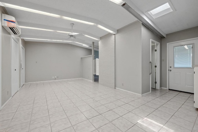 1314 Cloverleaf Dr, Austin, TX 78723 - unfurnished room with a wall unit AC, lofted ceiling, a ceiling fan, and light tile patterned floors