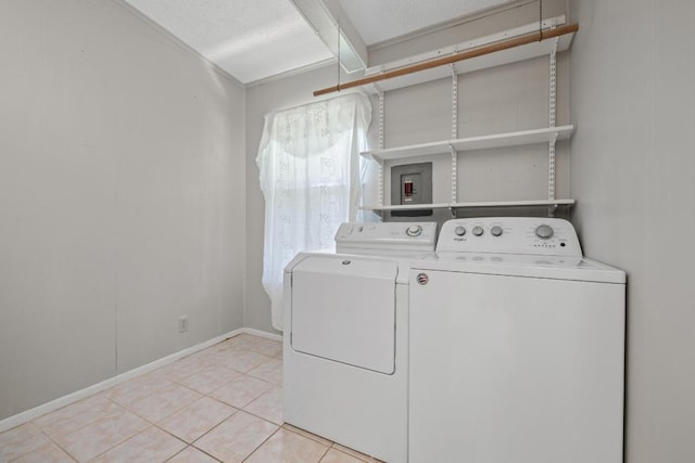 1314 Cloverleaf Dr, Austin, TX 78723 - laundry room with separate washer and dryer and tile patterned flooring