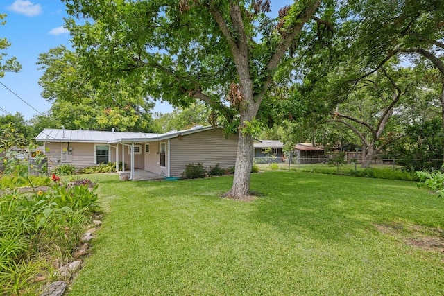 1314 Cloverleaf Dr, Austin, TX 78723 - view of yard with a patio