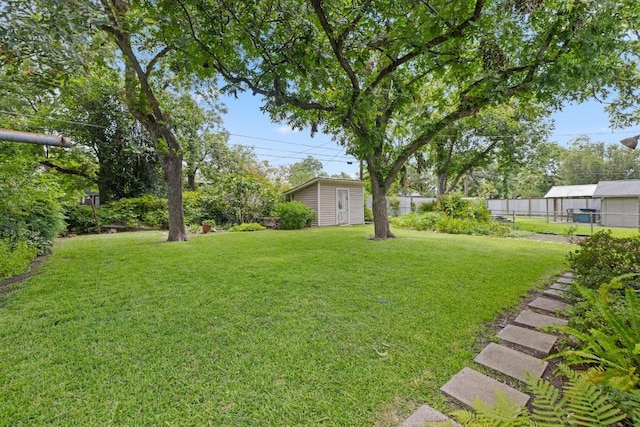 1314 Cloverleaf Dr, Austin, TX 78723 - view of yard with an outbuilding