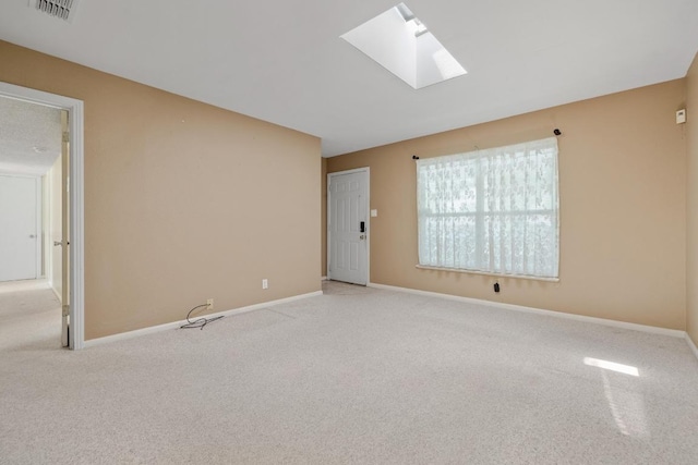 1314 Cloverleaf Dr, Austin, TX 78723 - spare room with a skylight and carpet floors